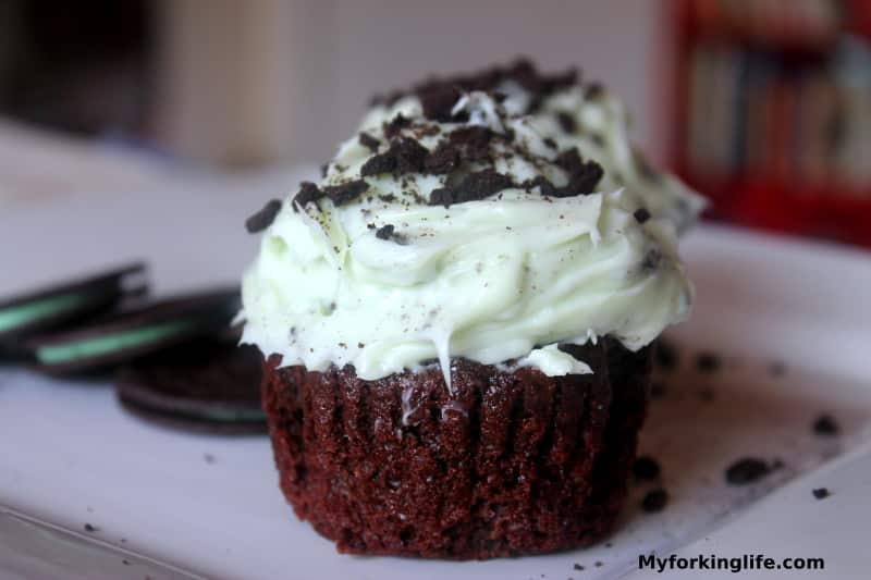 cupcakes sitting on a white plate