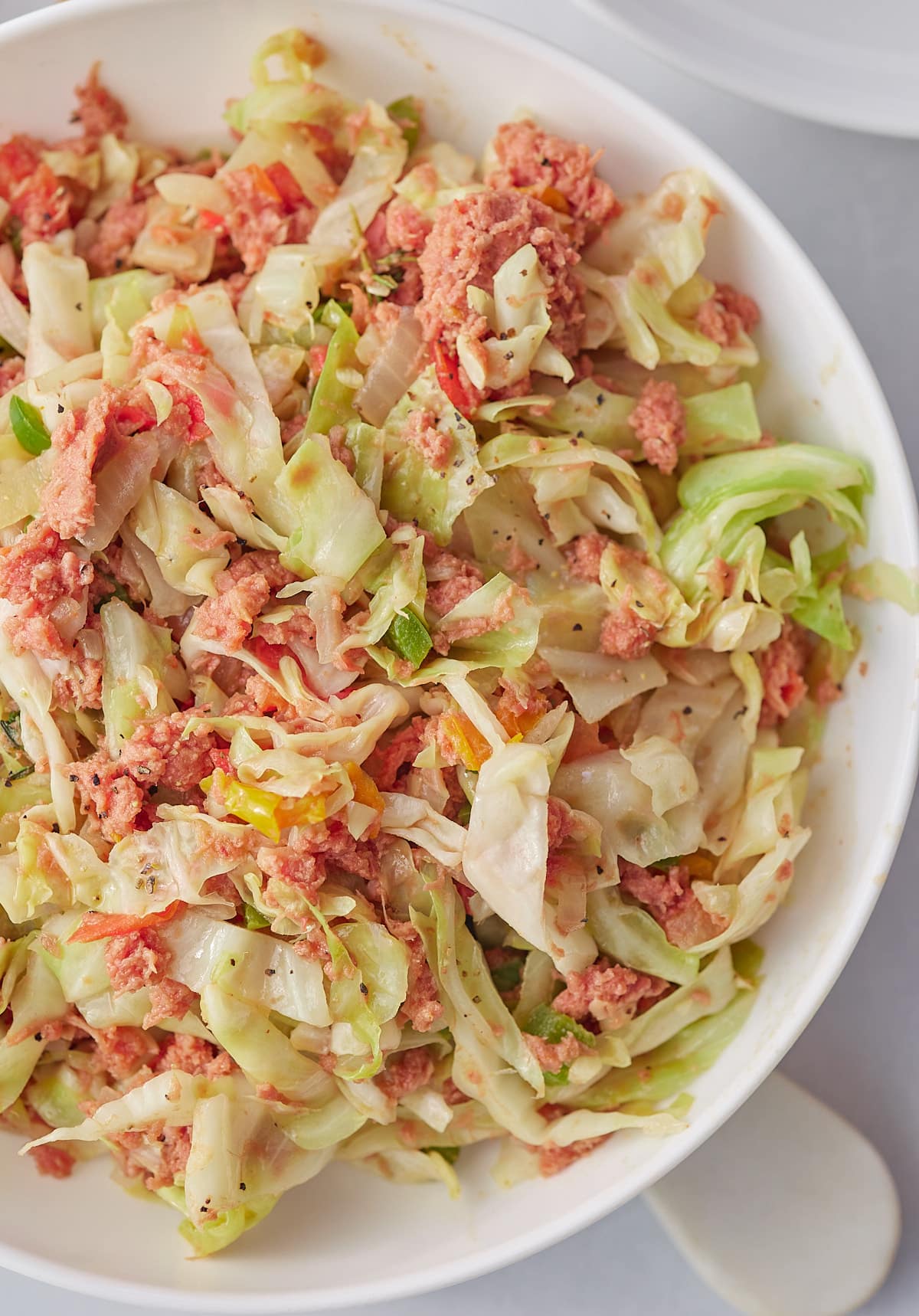 corned beef and cabbage in white bowl