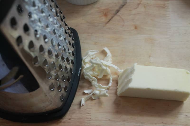 grater with butter on it