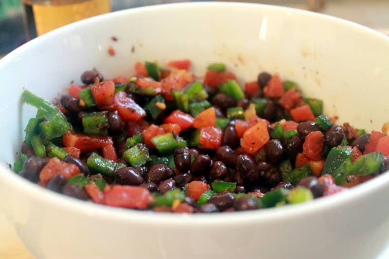 ingredients for sweet potato and black bean nachos in a bowl