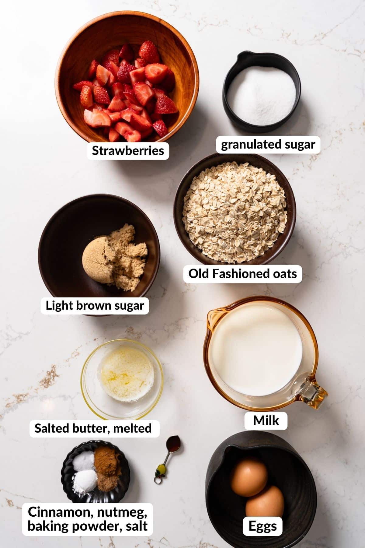 ingredients for strawberry baked oatmeal on table