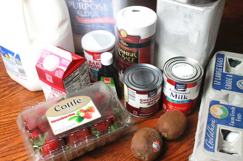 ingredients for tres leches cake on a table