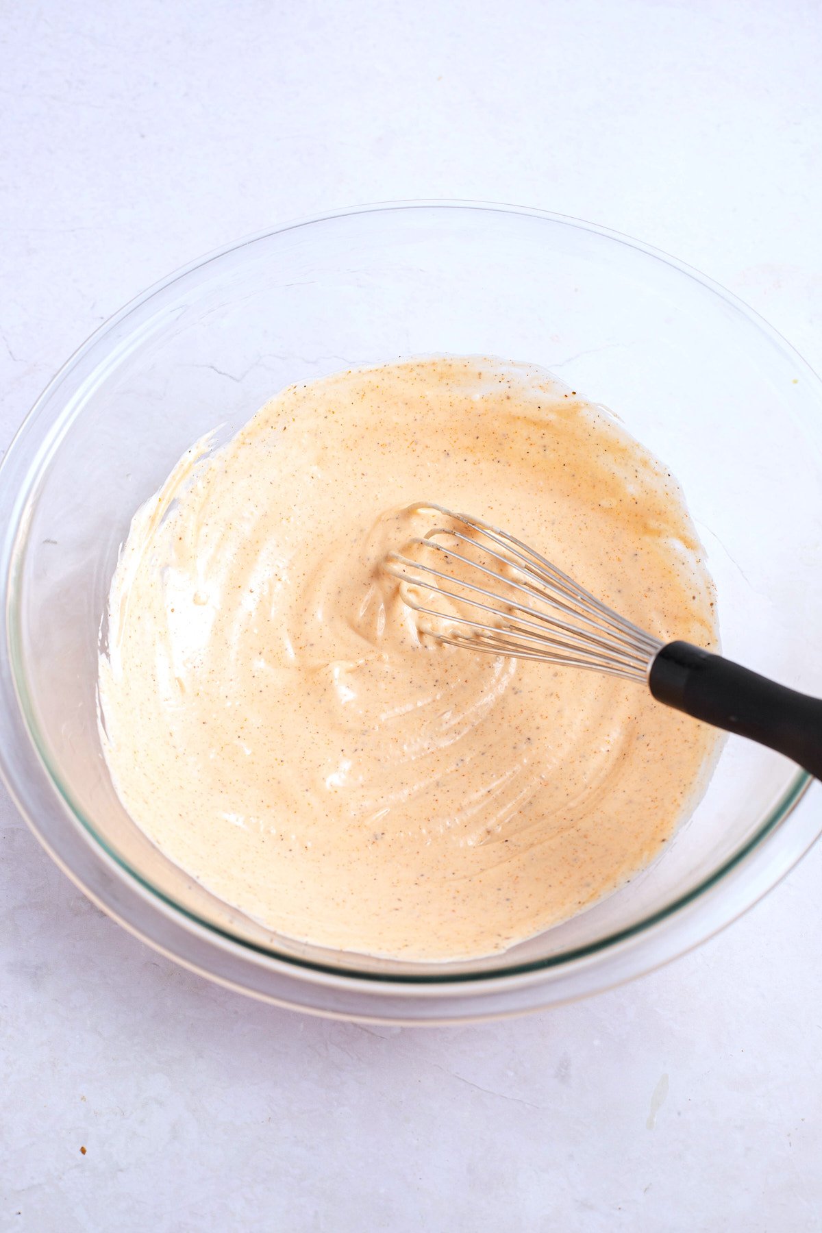 seafood salad dressing mixed in bowl