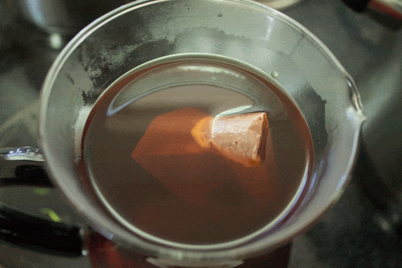 tea bags for iced tea in water in pitcher