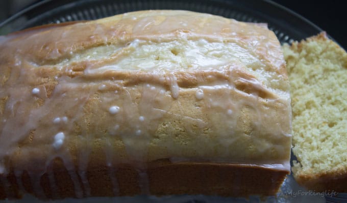 grapefruit cake on glass plate sliced