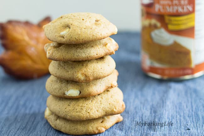 pumpkin cookies stacked on top of each other