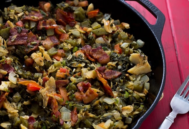 callaloo and saltfish on a skillet