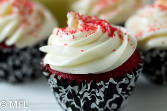 red velvet cupcake in black cupcake liners