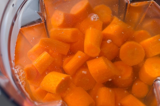 carrots in water. This Jamaican Style Carrot Juice Recipe is authentic and delicious! Perfect recipe for a hot summer day. #jamaicanrecipe #carrotjuice #condensed milk #juicerecipes