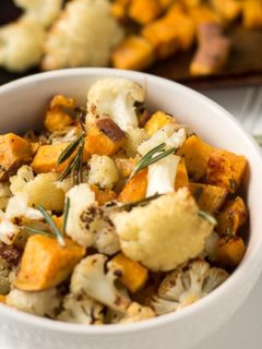 Roasted Cauliflower and sweet potato recipe. Great easy and healthy side dish. Sheet pan sides are perfect for dinner. Vegetarian sides. Gluten free. Vegan.