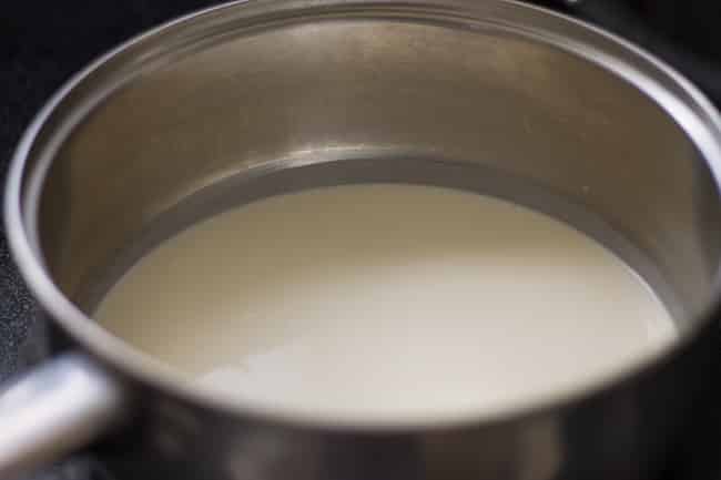 milk and heavy cream in saucepan
