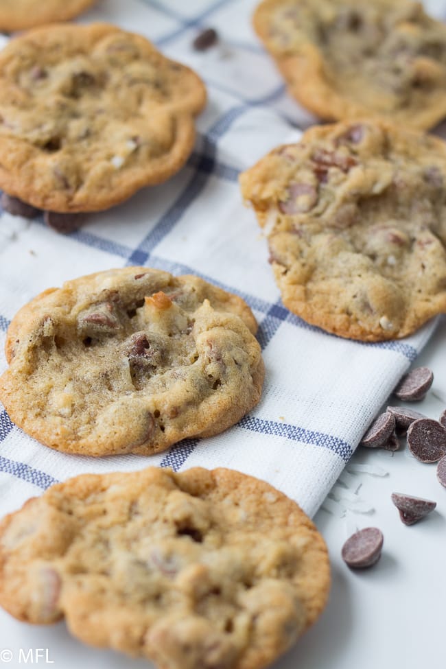 Chocolate chip pecan cookies on checkered kitchen towel