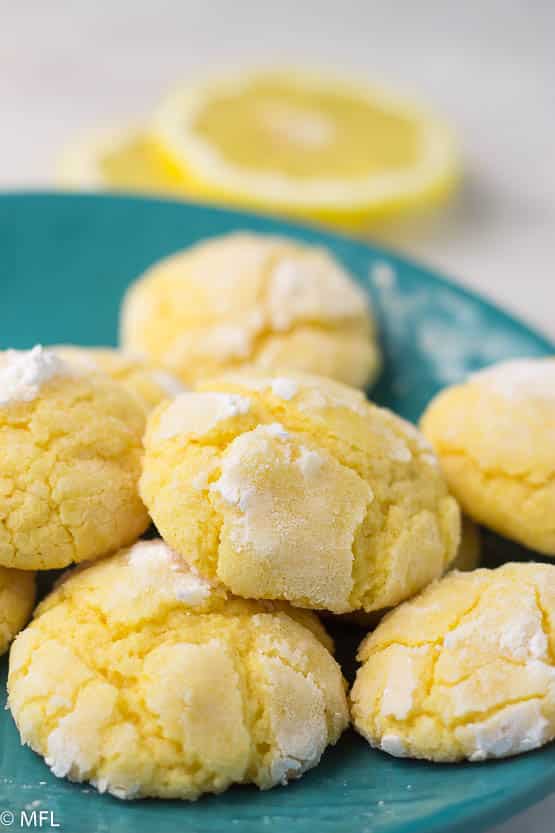 lemon crinkle cookies on a blue plate