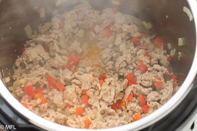 ground turkey cooking in pot