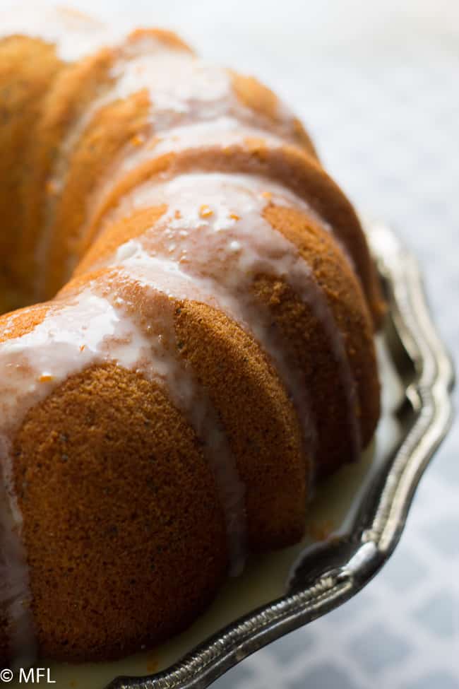 top of orange poppyseed bundt cake with glaze