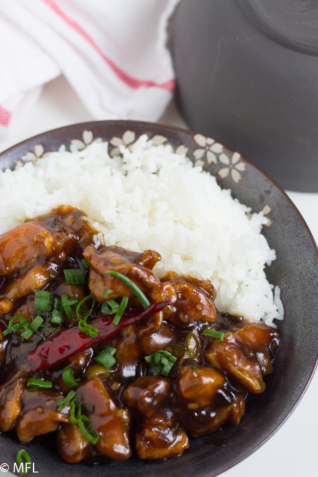 General tso chicken in bowl with red pepper