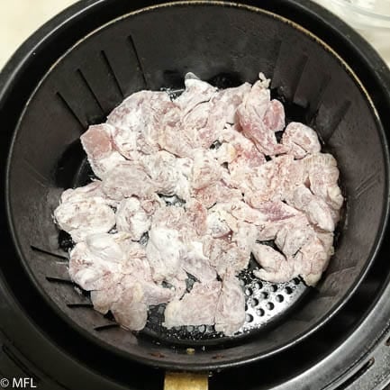 chicken pieces in air fryer basket