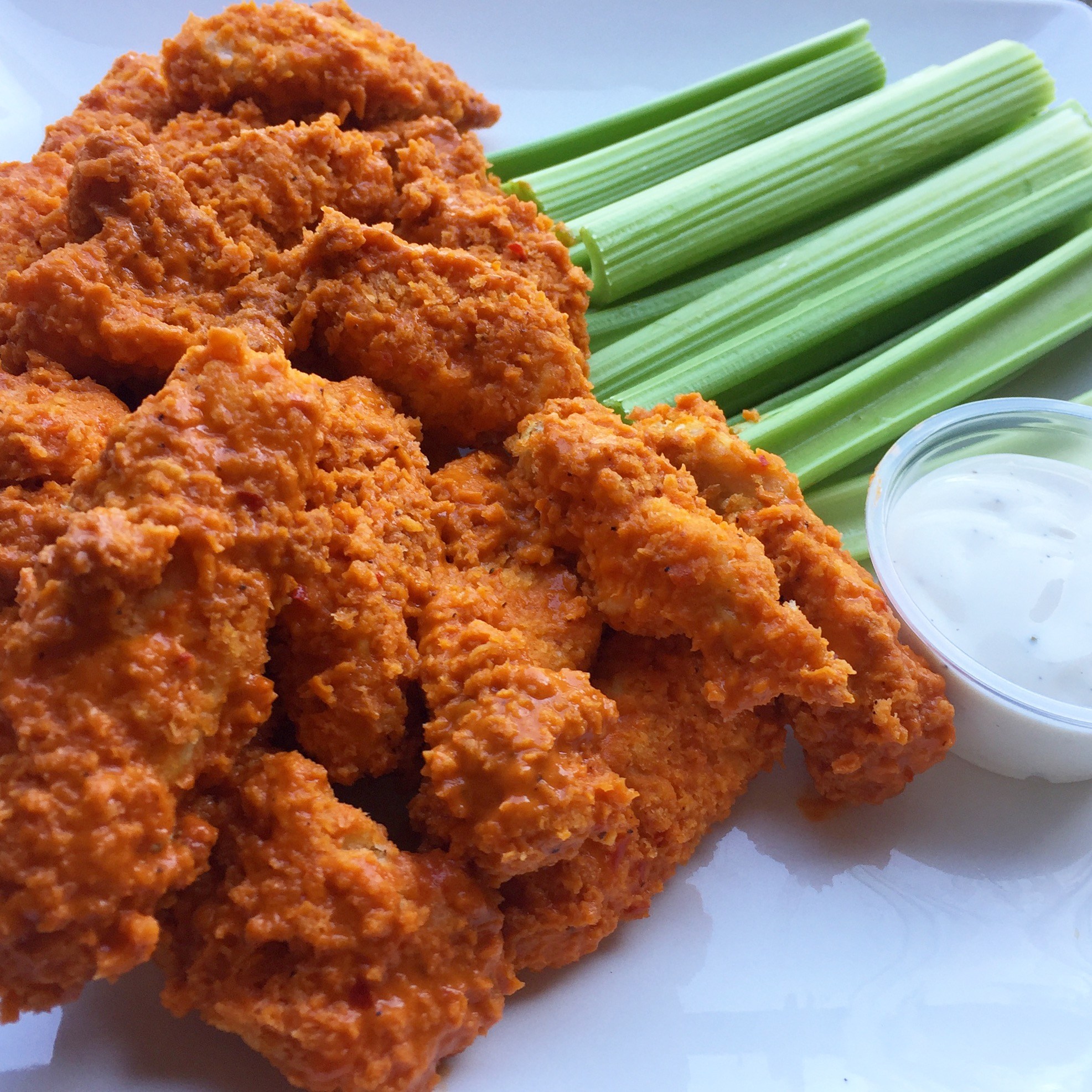 buffalo chicken in front of celery and ranch