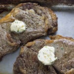 Perfect Air Fryer Steak with Garlic Herb Butter. Create the perfect steak in your air fryer. Tried and true method of creating juicy and delicious steak. #airfryerrecipes #airfryer #airfryersteak #ribeye #ribeyesteak #flavouredbutter #garlicherbbutter #delicioussteak @airfryerrecipe