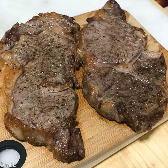 cooked steak on table