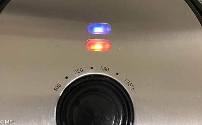 air fryer display with red and blue light