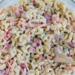 This Hawaiian Macaroni Salad is a sweet and tangy macaroni salad that is a twist on traditional macaroni salad. Covered in a delicious creamy sauce with bright vegetables, it's perfect for summer. #easy #hawaiian #sidedish #cookoutsides #mealprep #pastasalad #picnicsalad #summersalad #hawaiianmacaronisalad #myforkinglife