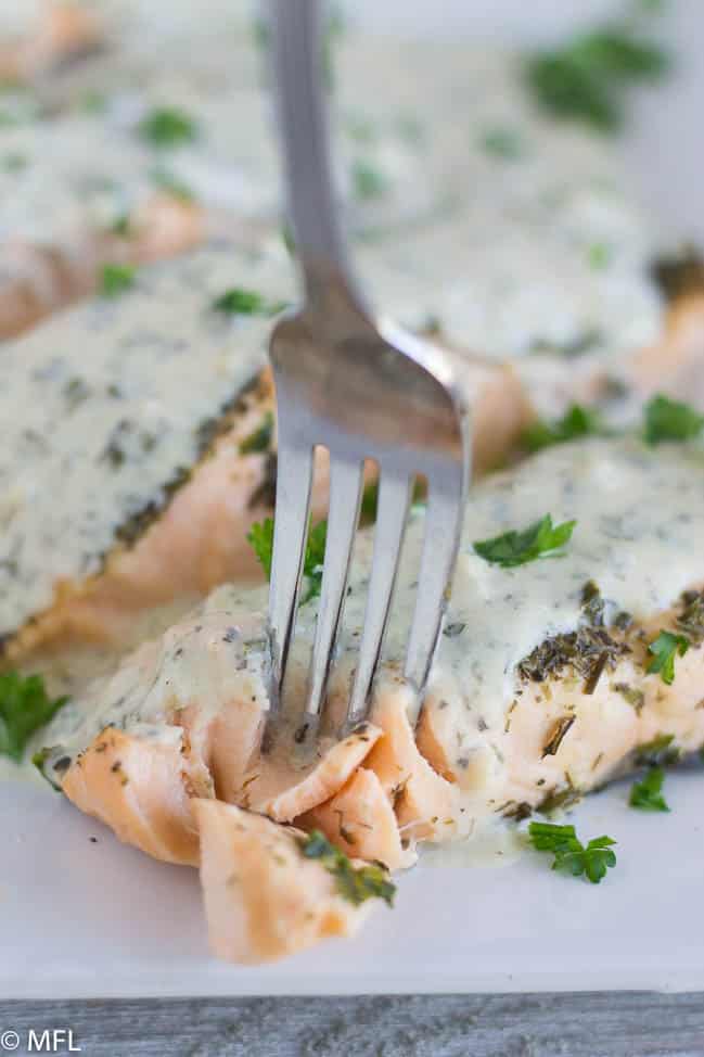 salmon with fork sticking out of it
