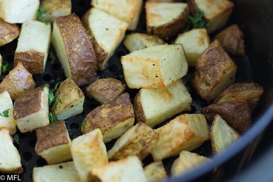 These Breakfast Air Fried Potatoes are crispy on the outside and tender on the inside, just how breakfast potatoes should be. Step by step photos included to get the perfect breakfast potatoes in the air fryer.  #airfryer #healthy #airfriedpotatoes #easy #airfryerrecipes #myforkinglife #potaesintheairfryer