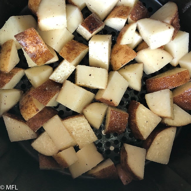 potatoes in air fryer basket