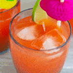 rum punch in glass with straw