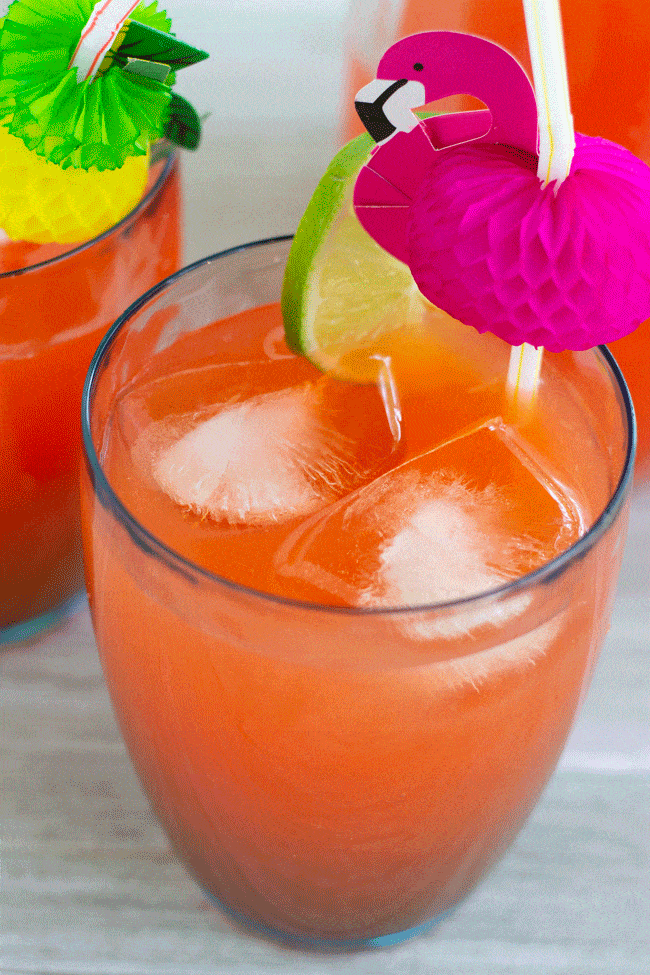 rum punch in glass with straw