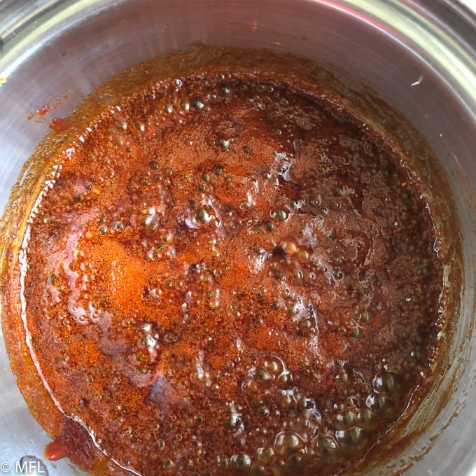 sauce cooking in saucepan