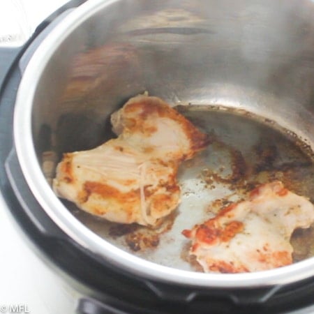 chicken in the instant pot that has been browned