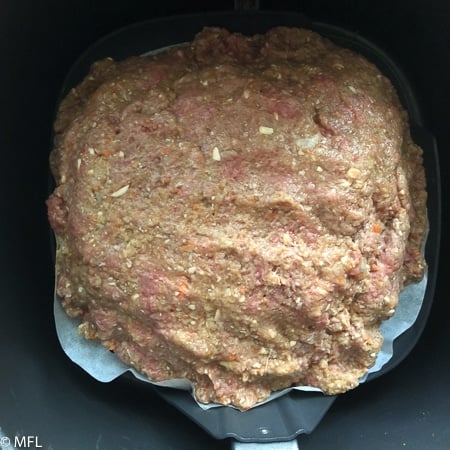 air fried meatloaf in air fryer before cooking