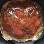 Meatloaf in Air Fryer with glaze on top.