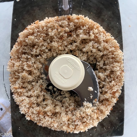 I like to start with making fresh breadcrumbs in a food processor.