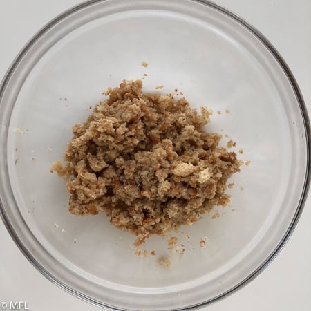 breadcrumbs and beefbroth in a small bowl for air fried meatloaf recipe.
