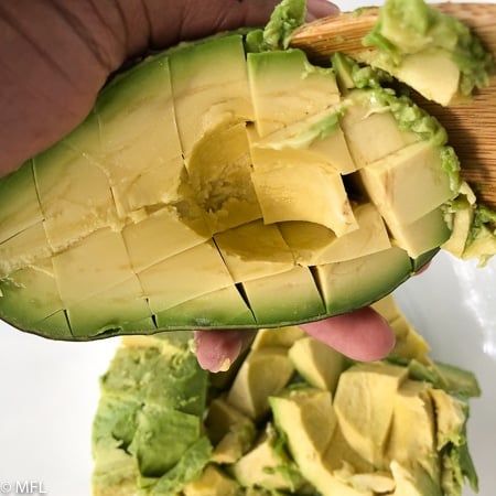 avocado cut in squares. These Copycat Cheesecake Factory Avocado Rolls are made in the Air Fryer and have half the calories and fat than the restaurant version. They are healthy but have the same great taste and crunch. #airfried #airfryerrecipe #copycatrecipe #avocadorecipes #dippingsauce