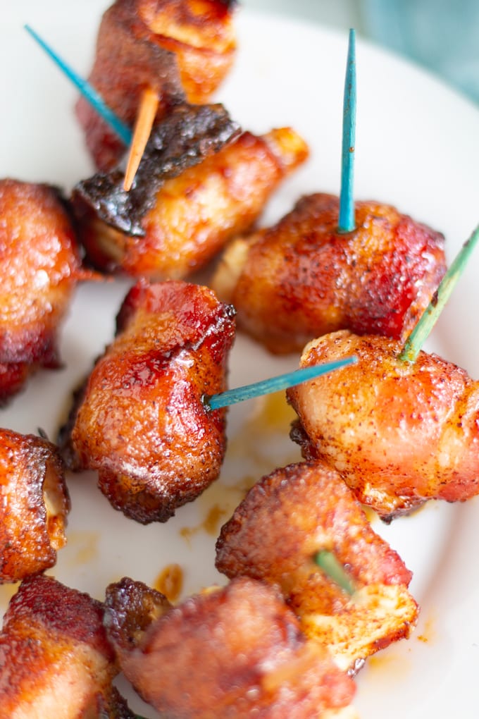 This Air Fryer Bacon Wrapped Chicken on white plate