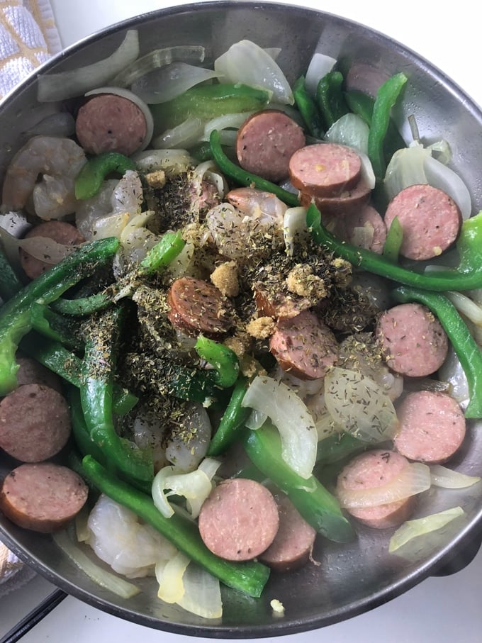 balsamic shrimp and sausage ingredients in a skillet