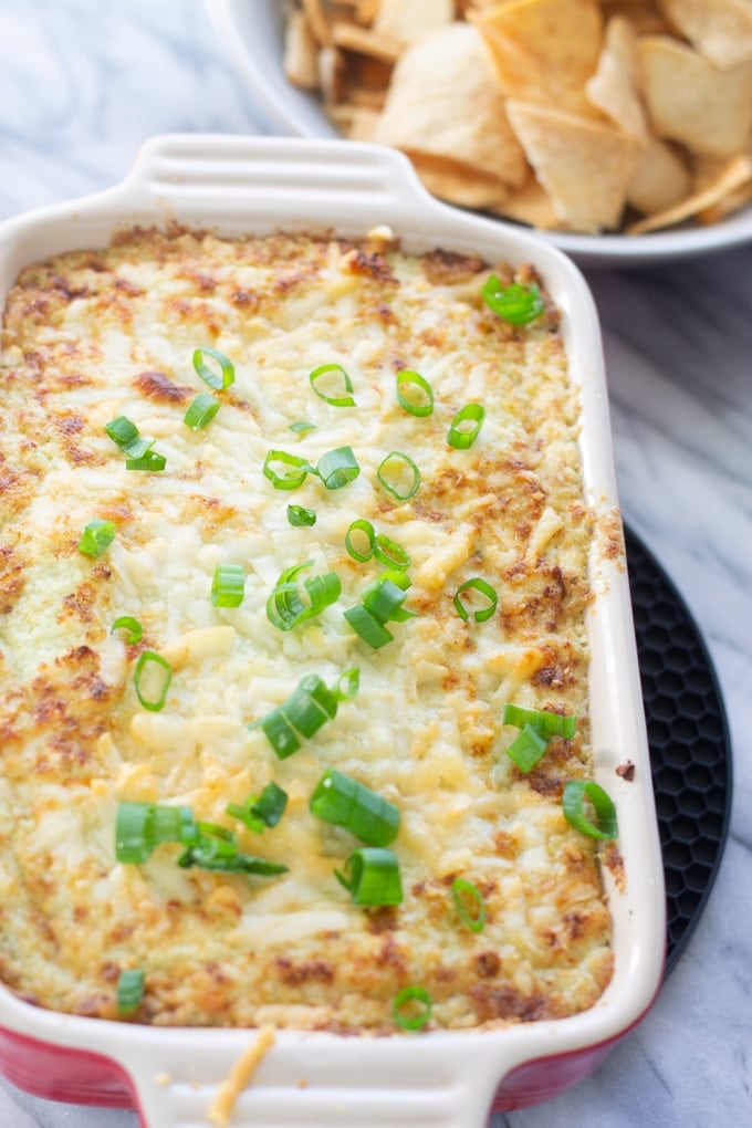 Delicious and easy Roasted Cauliflower Dip that is full of flavor and so easy to make. The perfect cheesy and healthy dip for any occasion. #healthy #roasted #superbowl #diprecipes finished photo of roasted cauliflower dip
