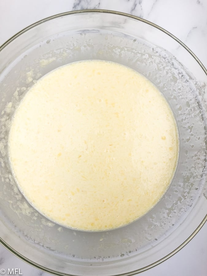liquid ingredients mixed together in bowl for instant pot bread pudding