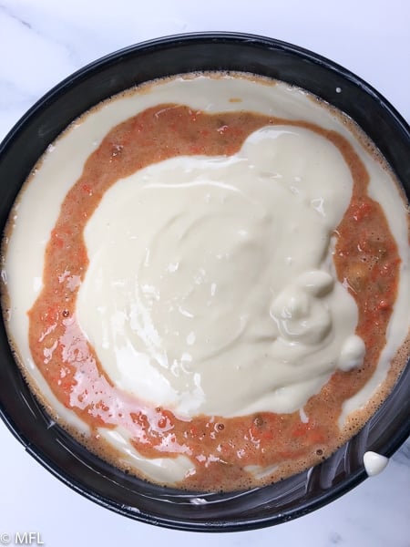 instant pot carrot cake cheesecake batter in springform pan