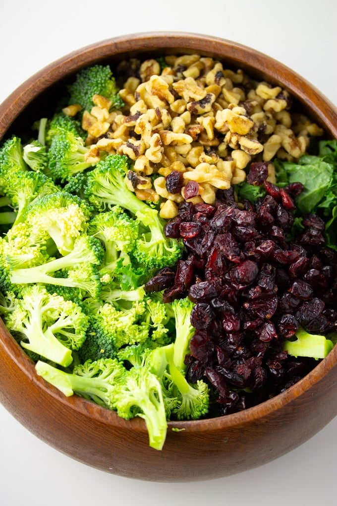 broccoli, cranberries, and walnuts in bowl