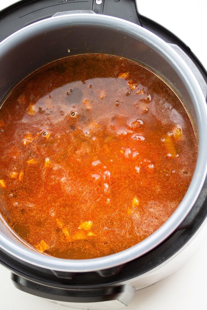 inside in the instant pot before cooking the pinto beans