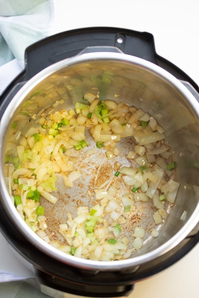 onions, garlic, and green onions in the Instant Pot