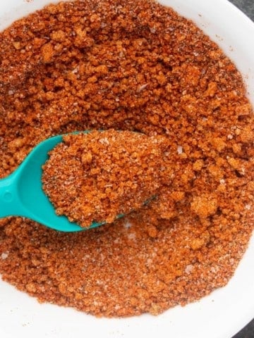 bbq seasoning in bowl with spoon sticking into it from left