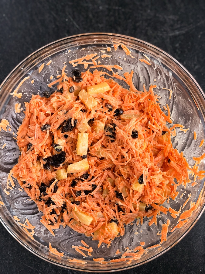 carrot raisin salad in bowl 