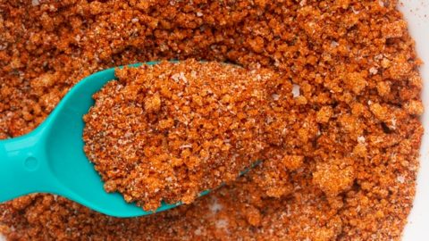 bbq seasoning in bowl with spoon sticking into it from left