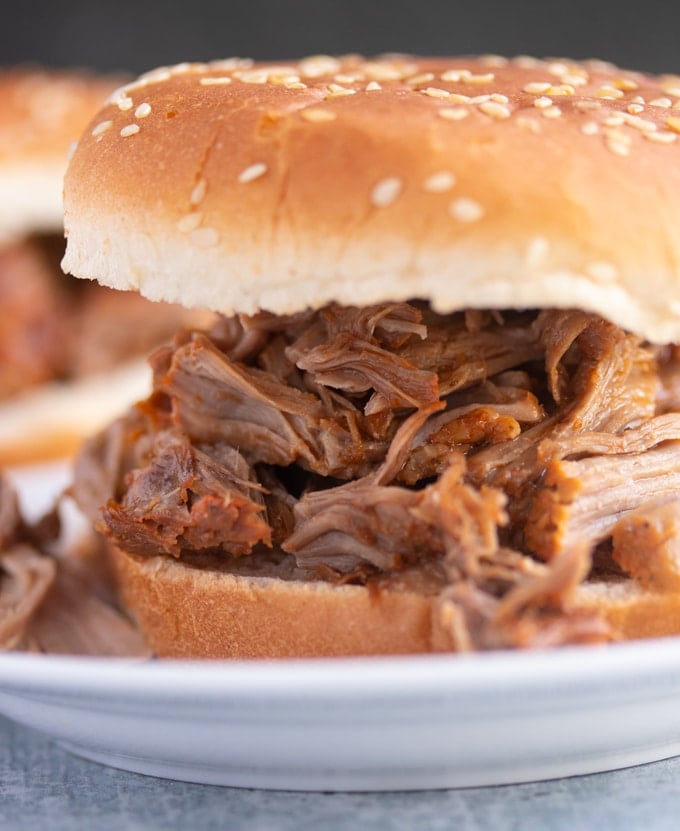 instant pot pulled pork on bread as a sandwich